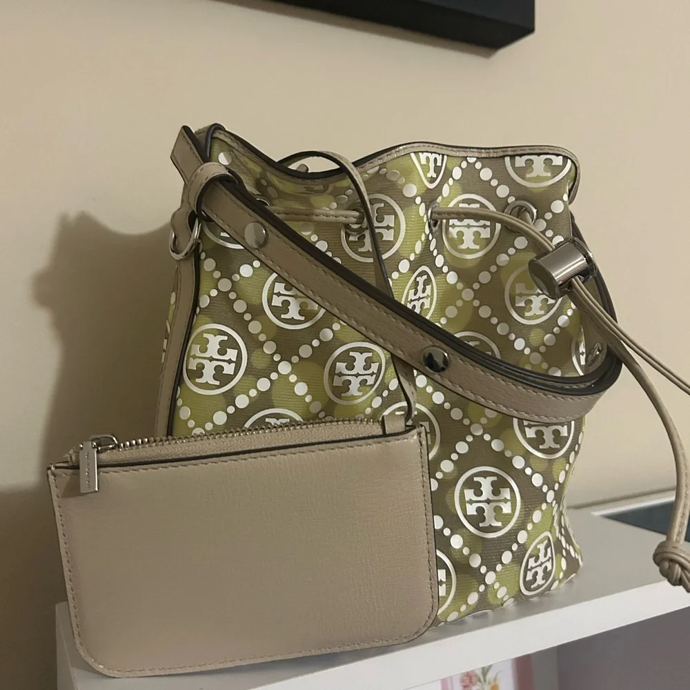 Tory Burch T Monogram Mesh Dot Bucket Bag
T Monogram Mesh Dot Bucket Bag - Picture 2 of 9